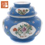 A Chinese porcelain sgrafitto ground bowl and cover: of squat form with stepped and domed cover,