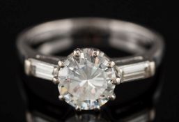 A diamond single-stone ring: the circular brilliant-cut diamond approximately 6.9mm x 3.