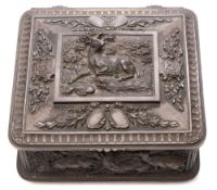 A late 19th century French bronzed and gilt decorated casket: decorated overall in relief with