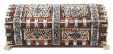 A 19th Century Indian tortoiseshell rectangular box;, with shallow domed lid,
