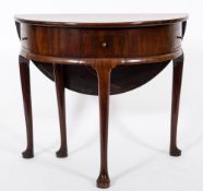 A George II mahogany half round single drop flap side table:, with a hinged top,