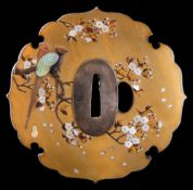 A fine Japanese silver mounted Shibayama-inlaid gold lacquer tsuba,
