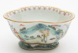 A Chinese famille rose trefoil bowl: the exterior painted with a continuous hunting scene in a