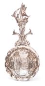A Continental silver caddy spoon bears import marks for William Geiger, London 1904:,