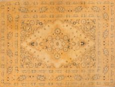 A Tabriz rug:,
