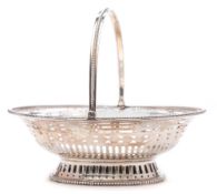 A George III silver swing-handled sweetmeat basket, marks worn, maker William Plummer, London,