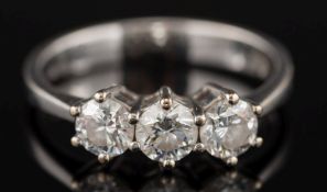 A diamond three- stone ring: with circular, brilliant-cut diamonds estimated to weigh a total of 0.
