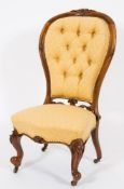 A lady's Victorian carved rosewood chair:, with upholstery to match lot 1068,