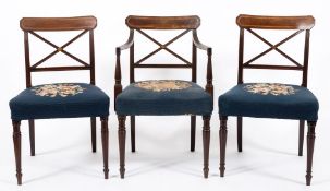 A set of six Regency mahogany and later inlaid dining chairs:,
