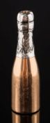 A propelling pencil in the form of a champagne bottle:, 45mm long, 15.5gms gross weight.