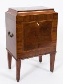 An early 19th Century mahogany and inlaid rectangular cellarette:, bordered with boxwood lines,