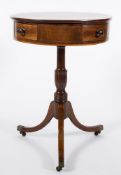 An early 19th Century mahogany and inlaid drum top occasional table:,