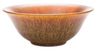 A 19th century rhino horn bowl: of shallow form with everted rim,