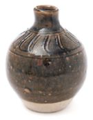 A Bernard Leach stoneware bud vase: of ovoid form with short neck,