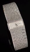 A lady's 9ct white gold 'Bueche Girod' wristwatch: the rectangular dial on 9ct gold integrated