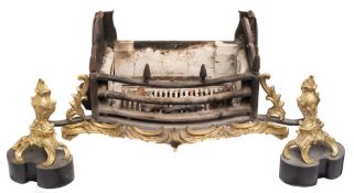 A good cast iron and gilt brass mounted bow fronted basket fire grate:,