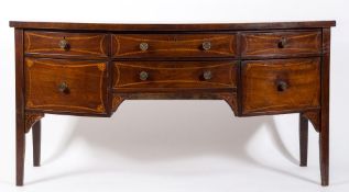 An early 19th Century mahogany and inlaid bow fronted sideboard:,