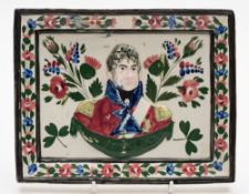 A Portabello pottery 'George IV' commemorative plaque: relief moulded and painted in pink, black,