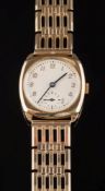 A gentleman's 9ct gold 'Speedwell' wristwatch: with circular dial 24mm diameter in a 9ct gold case