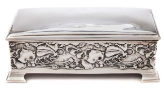 An Edward VII silver cigarette casket, maker Joseph Rodgers,