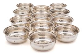 A set of twelve Edward VII silver finger bowls, maker Goldsmiths & Silversmiths Co Ltd, London,