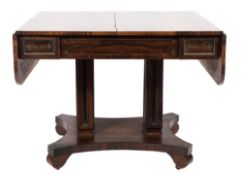 A William IV rosewood and brass inlaid sofa table:,