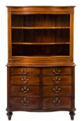 A George III mahogany serpentine-fronted chest:, the top with a moulded edge and cut corners,