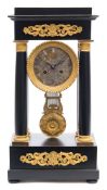 A French ebonised portico clock: the eight-day duration movement striking the hours and half-hours