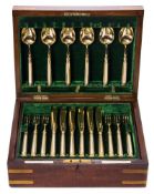 A set of twelve George V silver gilt dessert service, maker Goldsmiths & Silversmiths Co Ltd,