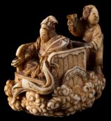 A Japanese carved ivory netsuke,
