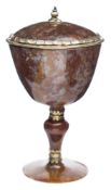 A German silver-gilt mounted moss agate cup and cover: with lappet shaped banded mounts,