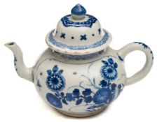 A Chinese porcelain wine pot and domed cover: of squat globular form painted in blue with a panel