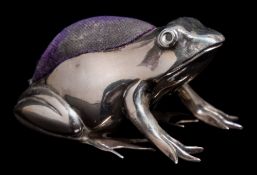 A George V silver pin cushion, maker Adie & Lovekin Ltd, Birmingham, 1910: in the form of a frog,