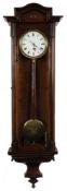 A small Vienna type regulator wall clock: the eight-day duration,
