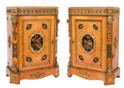 A pair of mid 19th Century kingwood, crossbanded and gilt metal mounted pier cabinets:,