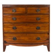 Of Naval Interest An early 19th Century mahogany and inlaid bow fronted chest:,
