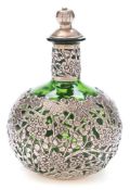 A Chinese green glass and silver mounted scent bottle and stopper by Wang Hing & Co,