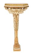 A carved giltwood and cream decorated console table:, in the 18th Century taste,