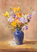 * Anne Cotteril [1933 -2010] - Still life of freesias in a blue vase:- signed bottom right oil on