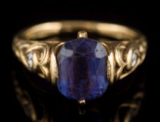 A tanzanite single-stone ring: the cushion shaped tanzanite 9.6mm long x 7.