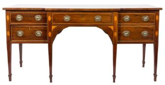 A 19th Century mahogany and inlaid breakfront sideboard:,