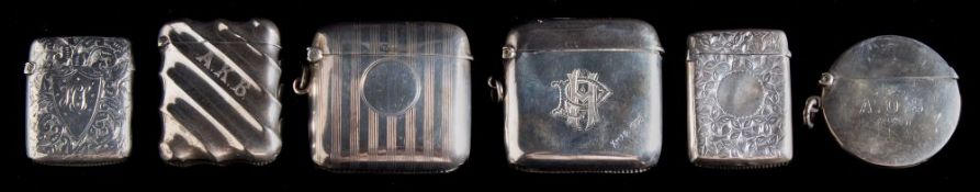 An Edward VII silver vesta case, maker Smith & Bartlam, Birmingham, 1918: initialled,