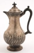 A late Victorian silver hot water jug, maker James Deakin & Sons, Sheffield,