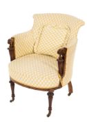 An Edwardian mahogany and inlaid tub-shaped armchair:,