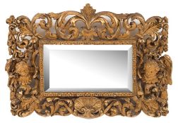 A 19th Century carved giltwood rectangular landscape mirror:, in the 17th Century taste,