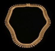 An 18ct gold fringe necklace:, 43gms gross weight.