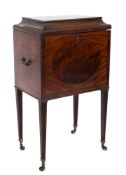 An Edwardian mahogany and inlaid rectangular cellarette:, in the Sheraton taste,