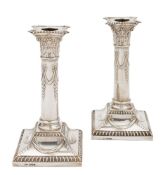 A pair of George V silver Corinthian column candlesticks, maker Lee & Wigfull, Sheffield,