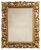 A late 19th Century carved giltwood Florentine frame wall mirror:,