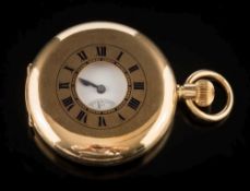 A gentleman's 18ct gold keyless lever half-hunter pocket watch: the circular white enamel dial 42mm